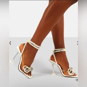 GLIMMER WHITE WRAP AROUND PEARL DETAIL BOW SQUARE TOE CAKE STAND HEELS